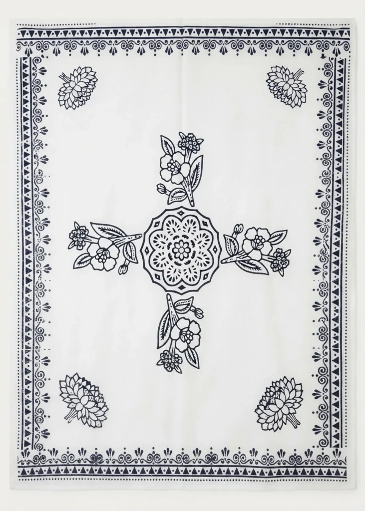 Merkezî Çiçekli Dört Kollu Yazma